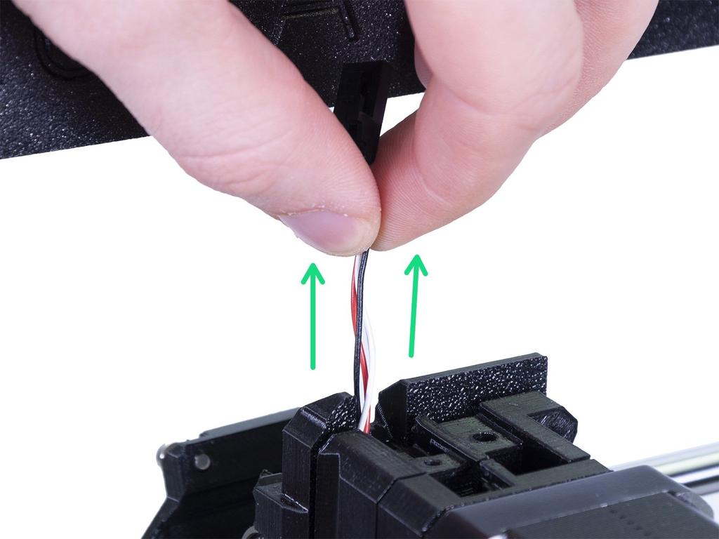 Step 10 Testing, testing! [Traduzione in corso] Grab the wires of the IR-sensor cable and gently pull up, the cable should slide without significant resistance. Does it move?