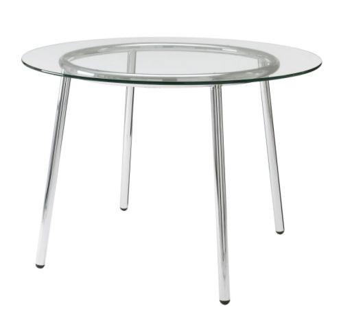 Tavolo con struttura metallica Table with metal structure Tavolo rettangolare piano vetro Rectangular glass table Tavolo rotondo in