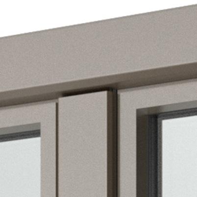 Anta semicomplanare con estetica a gradino e bordi smussati. Nell immagine: esecuzione a due ante, all esterno alluminio Classic 805 e all interno PVC rovere 19 perfette.