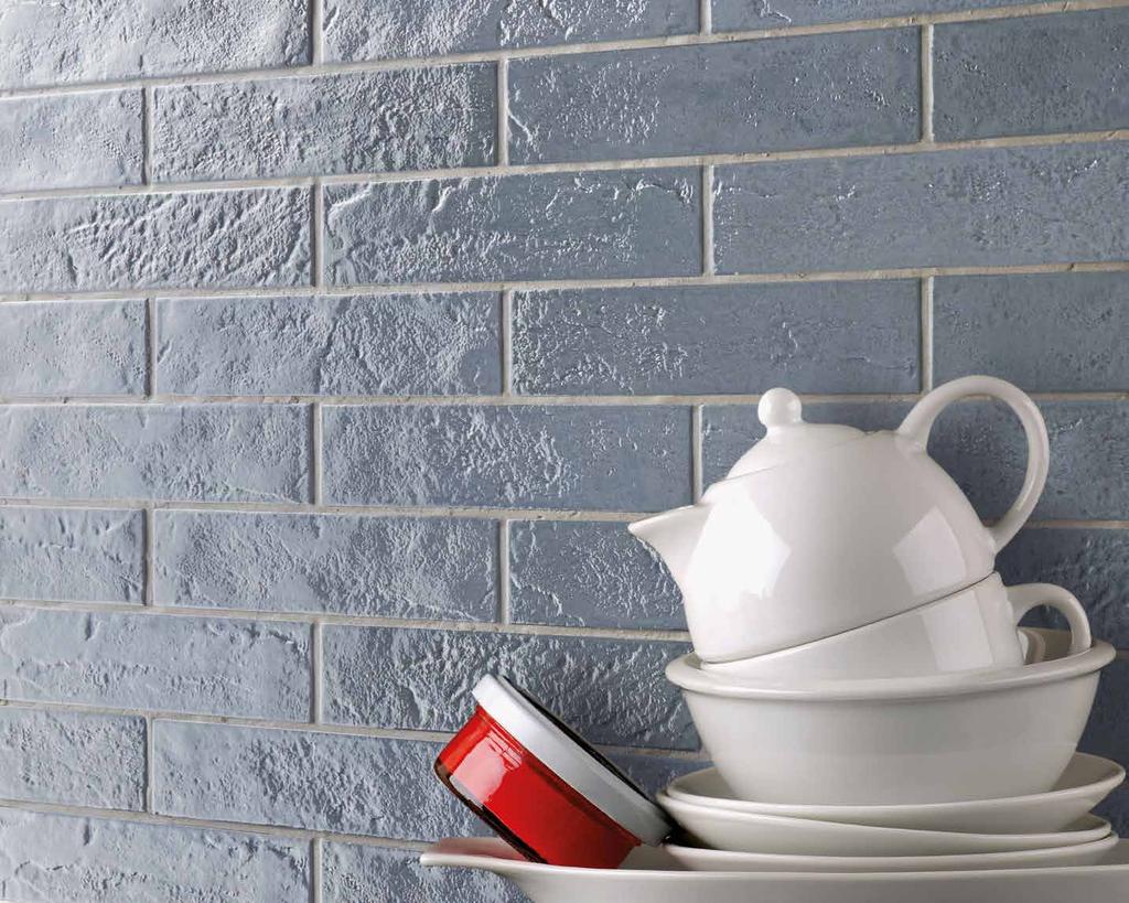 GRES PORCELLANATO SMALTATO GLAZED PORCELAIN STONEWARE GRES CERAME EMAILLE GLASIERTES FEINSTEINZEUG GRES PORCELÁNICO ESMALTADO ГЛАЗУРОВАННЫЙ КЕРАМОГРАНИT La serie Skyline interpreta l aspetto