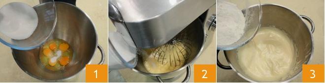 Per preparare il rotolo alla crema di nocciole, iniziate dalla preparazione della pasta biscotto: nella tazza di una planetaria versate le