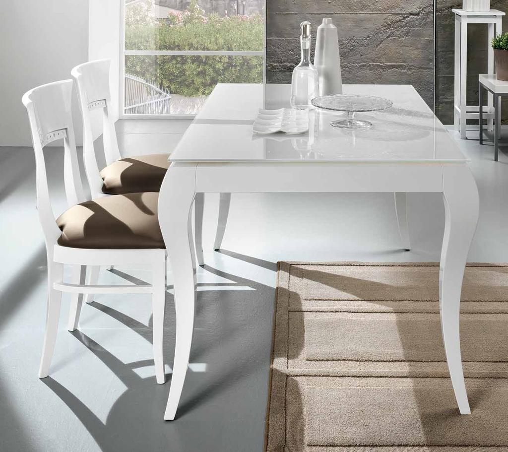 142 /FRIULSEDIE Catalogo 2017 Tavoli Infinity Infinity tables 143 Victor T86 _Tavolo Victor T86, faggio laccato bianco, piano vetro extrabianco V.XW.