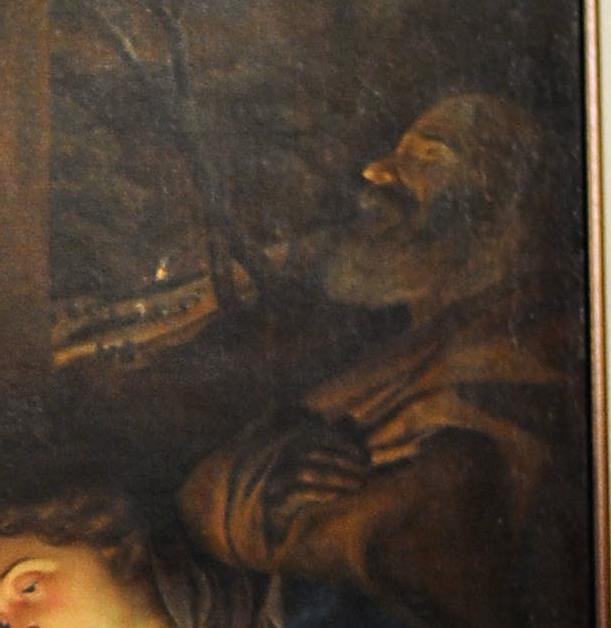 San Giuseppe: di spalle alla Vergine si confonde con i colori dello sfondo del quadro.