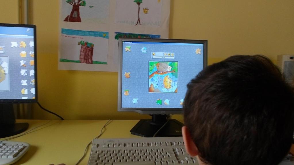 I bambini imparano ad usare il mouse giocando con Chip: trascinano i pezzi del puzzle per ricomporre l immagine dell uccellino Chip entra nella casa dell amica Paint che le fa