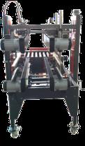 After pushing the box (already taped in the central part of the upper and lower box sides) towards the input direction, the power roller conveyors will drive the box towards the