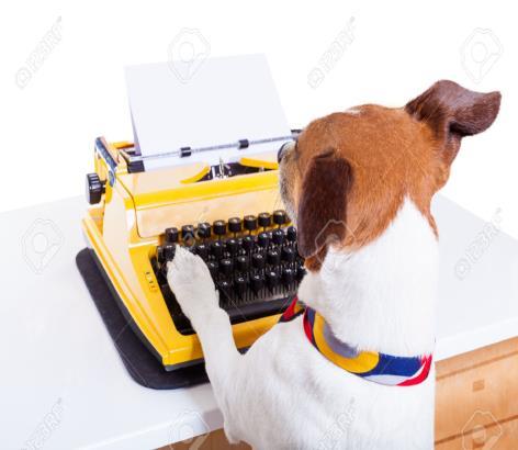 2 Un cane in gravatta che scrive al computer: «au au.