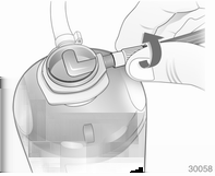 Cura del veicolo 193 1. Prelevare il kit di riparazione dei pneumatici dallo scomparto. 2. Rimuovere il compressore. Il kit di riparazione dei pneumatici si trova sul lato destro del vano posteriore.