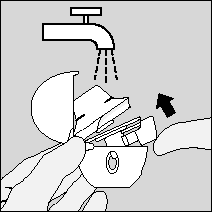 5. Tenere il dispositivo HandiHaler con il boccaglio rivolto verso l alto e premere a fondo una volta sola il pulsante di foratura e quindi rilasciare.