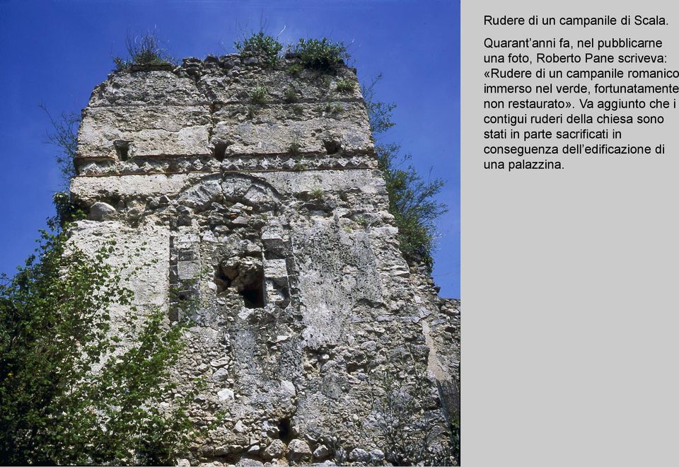 un campanile romanico immerso nel verde, fortunatamente non restaurato».