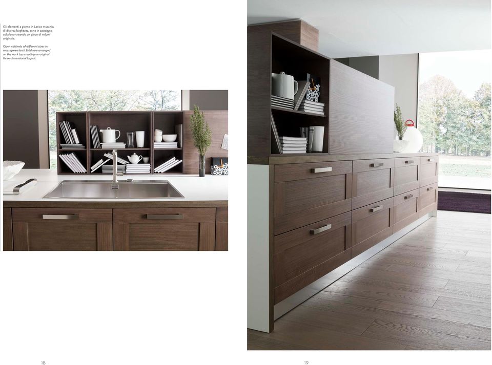 Open cabinets of different sizes in moss-green larch finish are