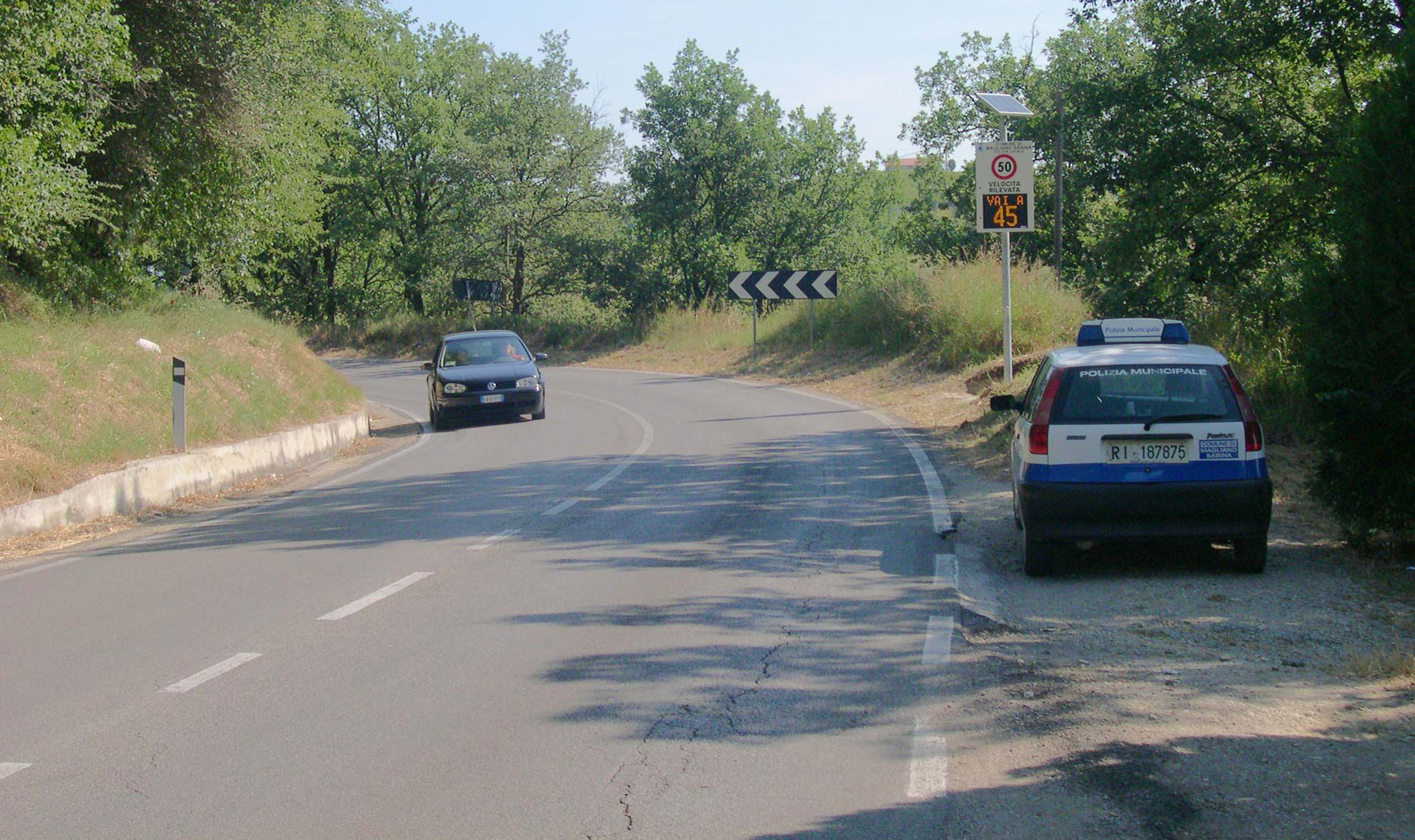 S. P. 54 DIREZIONE MONTEBUONO - RIETI KM 21 + 550, speed display in loc. Madonna Grande, prima di accessi ad abitazioni private ed attività commerciali e produttive.