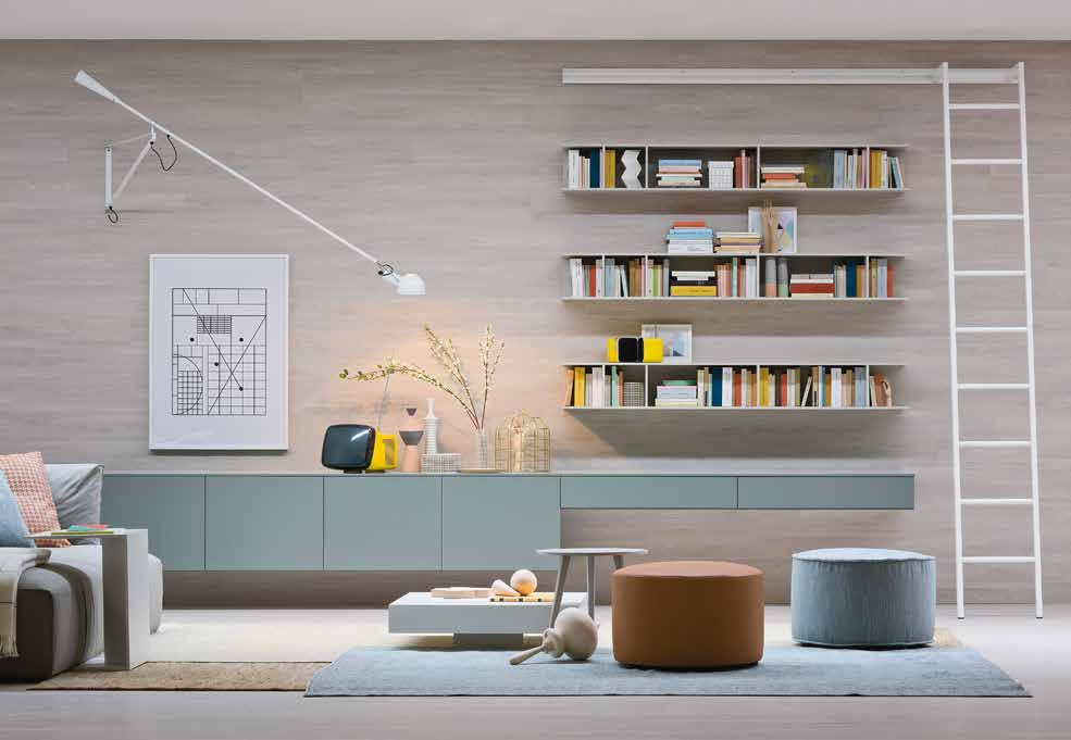 18 About style 002 19 Wall systems and bookcases Composizione con basi in laccato opaco artico e tre librerie Butterfly orizzontali in laccato opaco corda con scala in laccato opaco bianco.