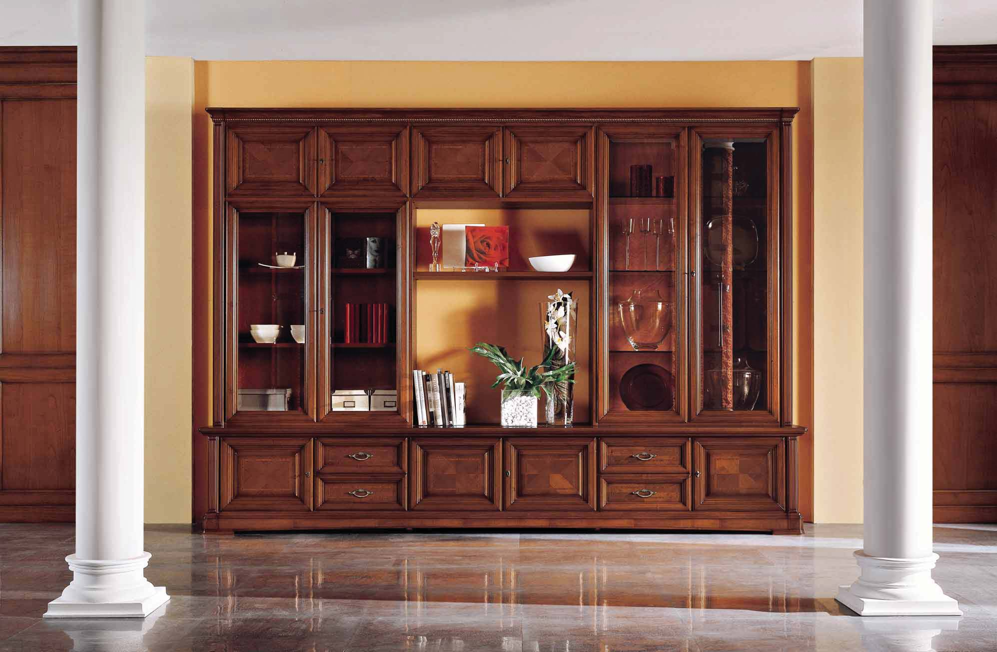 ART. P4060 Soggiorno componibile con 4 porte vetro, 8 porte legno, 4 cassetti e vani a giorno.