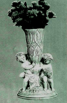 alt.cm.100x51-kg.139 Art.280 Putto con vaso alt.