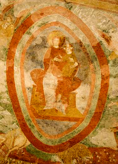 L abside - Madonna all'interno della mandorla Qual è il significato della mandorla? Perché al suo interno si trova la Madonna anziché Cristo?