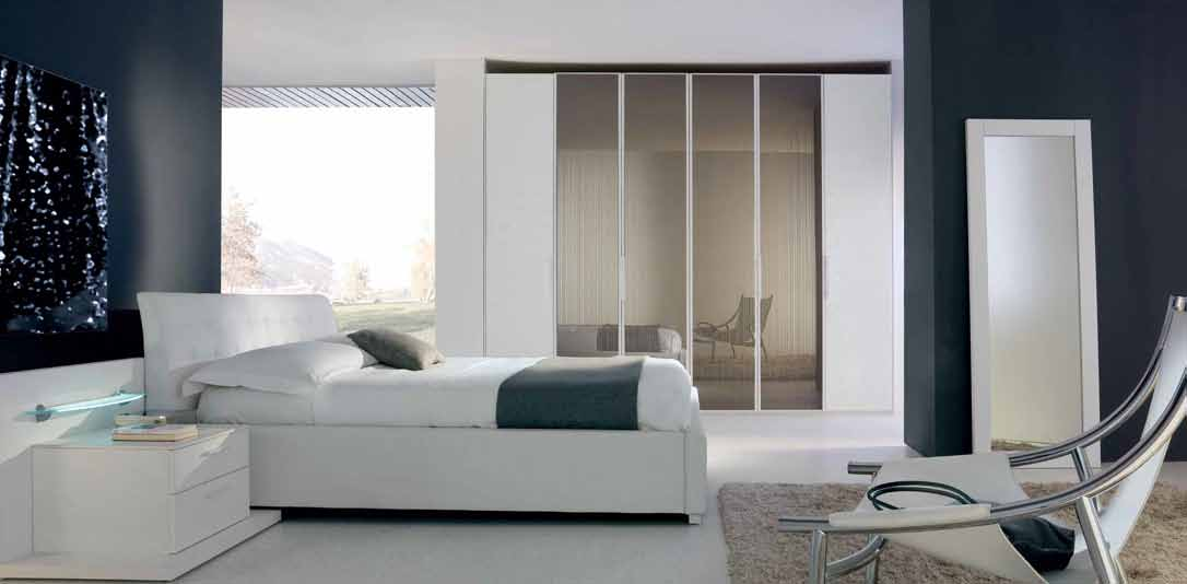 52 53 Letto Sidney in ecopelle lavorata a quadri, versione box contenitore.