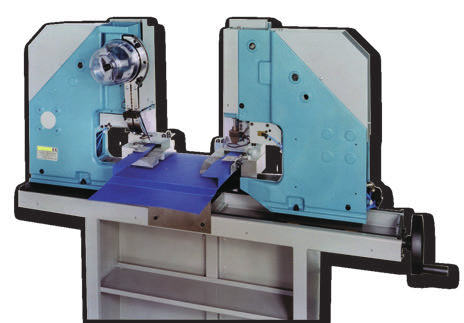 Pneumatic riveting / eyeleting machine with two vertical heads for production of special folders The machine is equipped for fixing of rivets / eyelets for blocking the flaps of