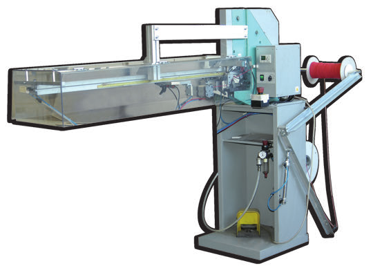 Versione SI 80, lunghezza max 80 cm, versione SI 100 lunghezza max 100 cm. Automatic machine for fixing of metal ends on elastics or cords from roll The machine fix metal ends on elastics or cords.