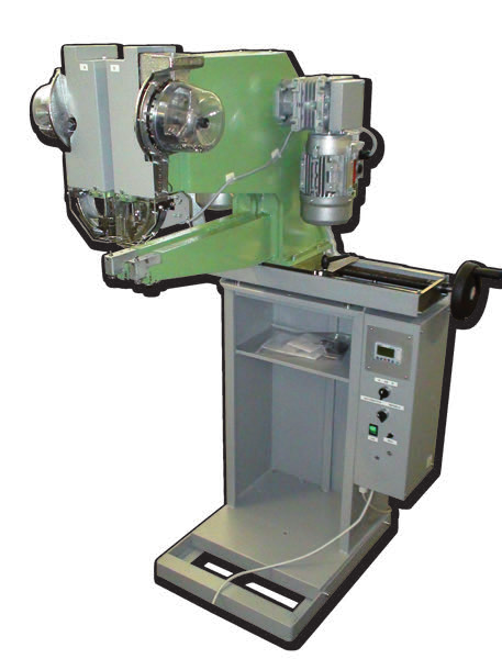 Rivetting machine with two adjustable heads and with a special program for setting up of the rivets