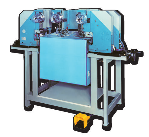 Pneumatic riveting machine with five adjustable heads for production of boxes The machine is made for automatic riveting of the bottom of the box by five self piercing rivets.