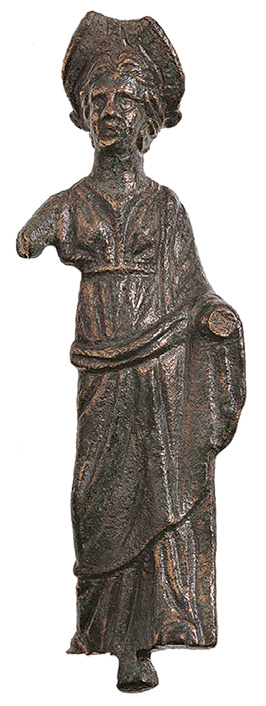 A. Caravale Fig. 1 Bronzetto votivo femminile della collezione Faina (foto Museo). ad avviare un nuovo percorso di studio sui bronzi della raccolta.