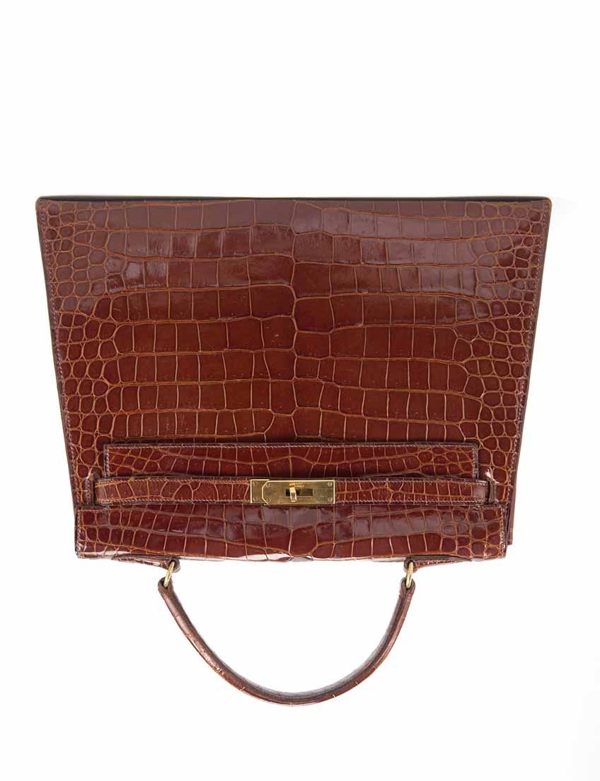 1947 1947 HERMES Borsa Kelly in coccodrillo color cognac, fine anni 50 (cm 33) (lievi segni d'uso)