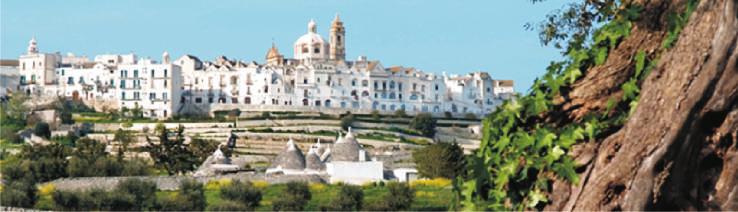 Visita della Valle d Itria, decorata dalla presenza di masserie a forma di trulli e costituita da comuni posti a 400 m sul livello del mare come Cisternino e Locorotondo.