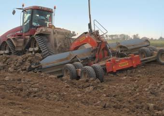 UNTIL 700 HP. GENERAL INFORMATION Towed grader arranged to be controlled by or GPS system with broken-line gooseneck bin chassis.