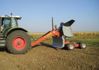 Gooseneck chassis with bin, wide port between blades and chassis, ensuring the machine can contain a large amount of soil, at