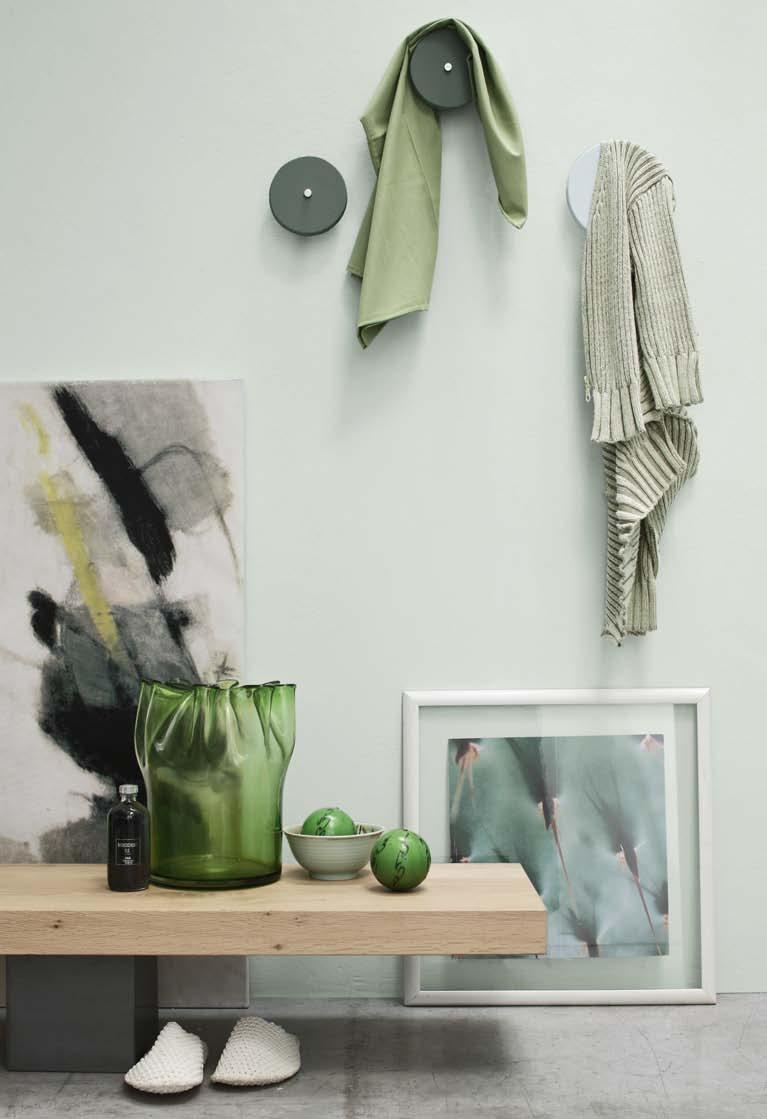 The shaped shelves, overlapping with the mirror are pleasant to look at and practical