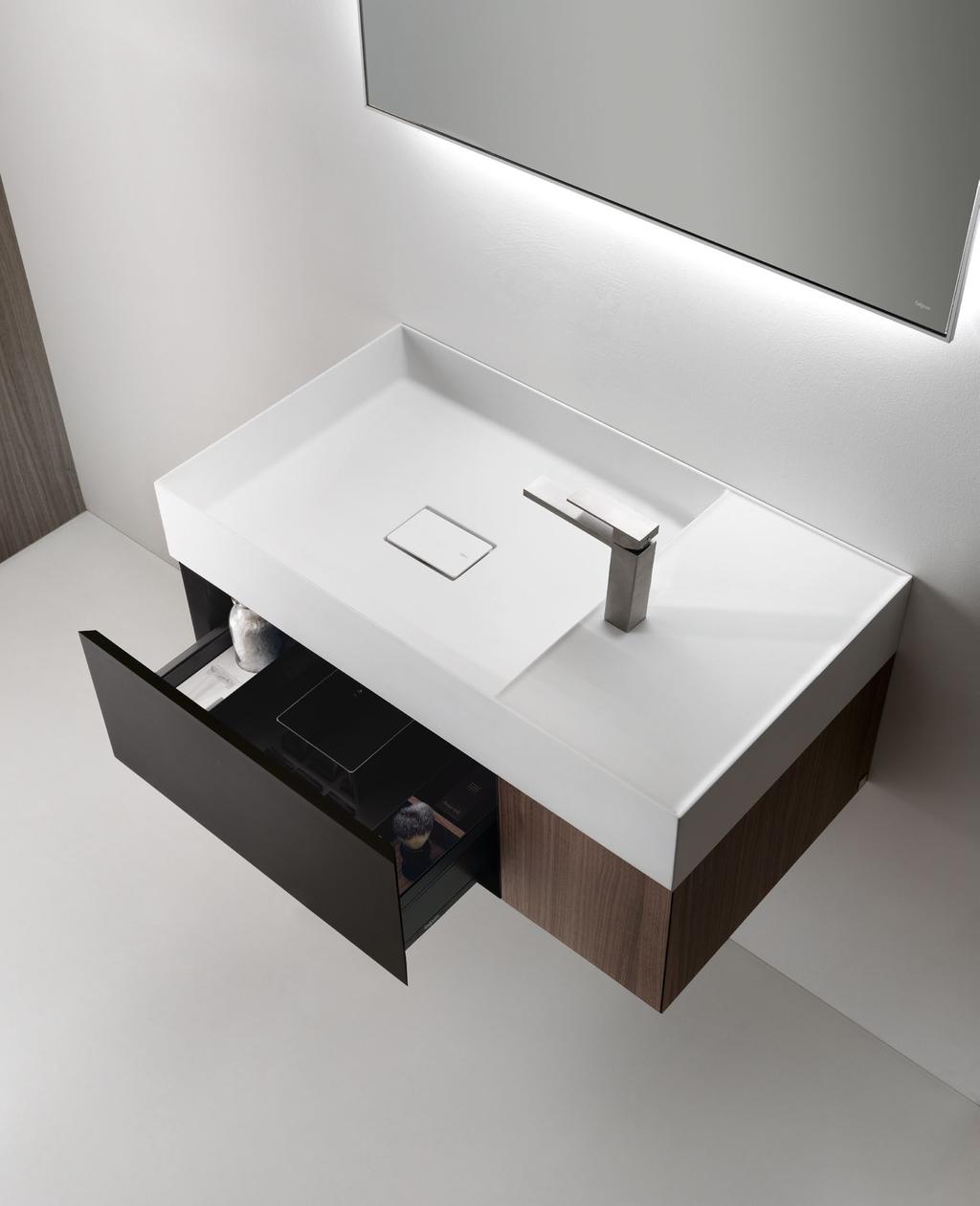 / Furniture unit with drawer and door or open-front compartment measuring 80 x 45 x h 25 cm with D8J washbasin in Ceramilux SSL with 25 cm side shelf and tapware on side shelf.