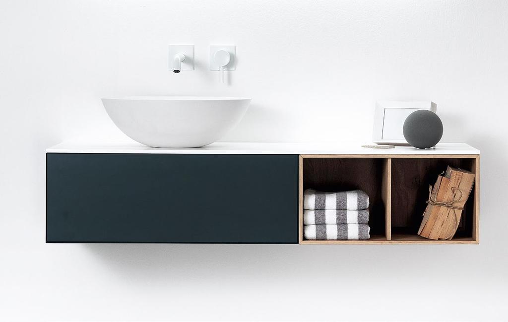 Dimensioni: cm 120 x 45 x h 25 / Representative of the many solutions with countertop washbasin and and drip edge top available in the collection, this composition is obtained with h 25 elements.