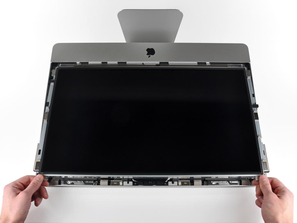 Passo 4 Sollevare leggermente il bordo superiore del display dal case esterno.