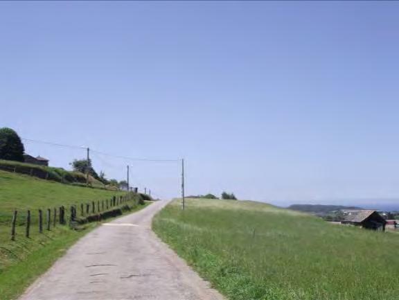 Si avvicendano i cartelli di Villuir, Otur seguiti dal barrio di El Relion e di El Carreion.