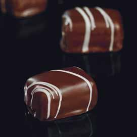 ) AMARETTO praline and flakes of macaroons and almond paste coated with fine extra dark chocolate peso (gr) 1500 Pz per kg 80 ca.