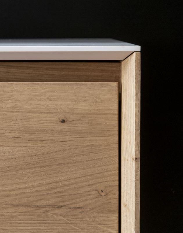 Picture: double top with built-in basin in biobased Cristalplant, drawers in Solid Oak with top in biobased Cristalplant.