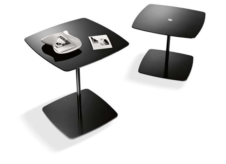 Small table with top in black or white lacquered glass. Base in black or white lacquered metal.