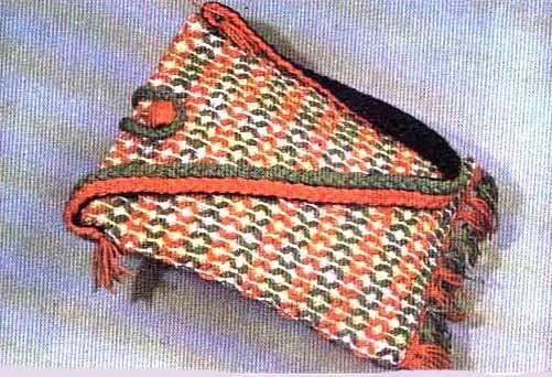 Bag with cut rhombus pattern (see detail of the handle which, here, was embroidered with small crosses.