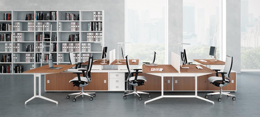 THE OPERATIVE BOX EXPANDS FUNCTIONALITY AND WORKING SURFACES Desks integrated with boxes equipped with flip-up flaps for the cable management and sliding door.