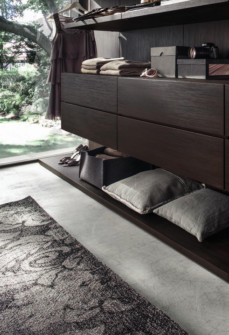 0 0 K_obi K_Obi Walk-in closet Una base Obi sospesa con sei ampi cassetti, i frontali con