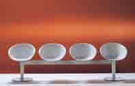 Gliss benches, three or four seats with white, ivory or beige technopolymer shell. Brushed stainless steel frame.