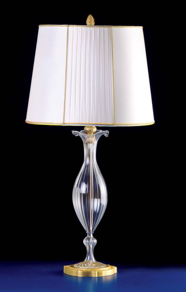 Table lamp made of fine gold-plated solid brass with hand-worked glass column. Ivory coloured plaited shade. Mod. 1598/P + P. 1598/P Come il modello 1598 + P ma in dimensioni ridotte.