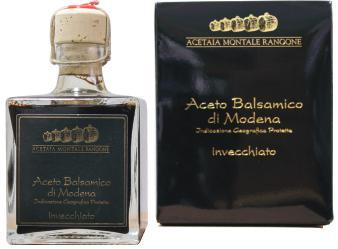 INVECCHIATO Aceto balsamico di Modena I.G.P Confezione: In bottiglie da 250 ml impreziosite da un elegante scatola. Colore: denso, brillante, carico, bruno scuro. Densità: di alta corposità, denso.