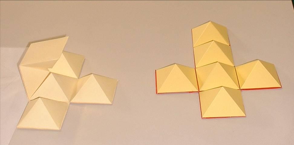E Se si costruiscono sei piramidi uguali e poi si incollano sullo sviluppo del cubo, si possono ripiegare verso l interno e si ottiene il cubo suddiviso in sei piramidi ( e questo dà come