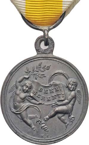 di sospensione dal nastro, segno distintivo della prima serie di esemplari coniati con chiaro segno militare. 182 Medaglia premio militare 1832 a.