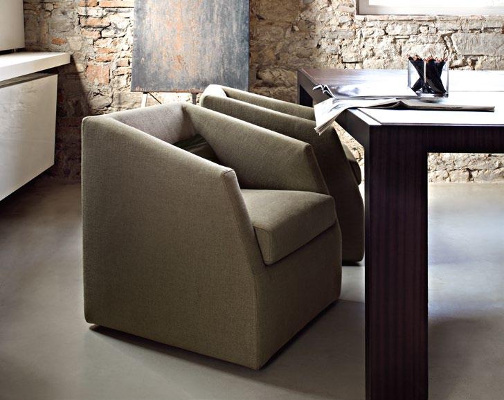 POGGIO Design Massimo Lorusso 2010 Armchairs in fabric A/1058 collection Look. Low back cushion in fabric D/4681 collection Camisia. Poltrone in tessuto collezione Look A/1058.