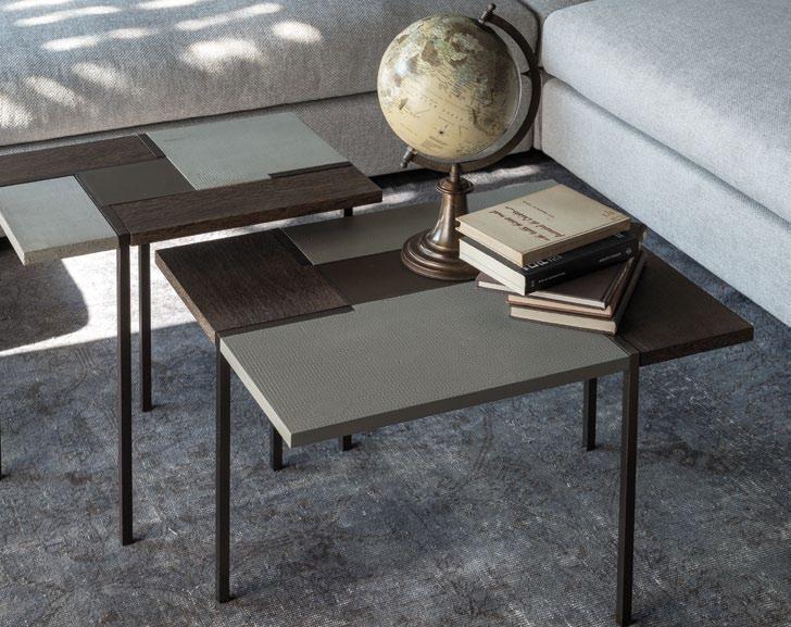 The square metal legs, brown, brass or titanium stained, are also integrated in the top.