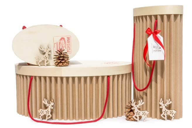 PACKAGING Su richiesta potete impreziosire il Vostro Regalo con packaging esclusivo realizzato in cartone ondulato con coperchio in foglia di legno, cordini rossi per facile