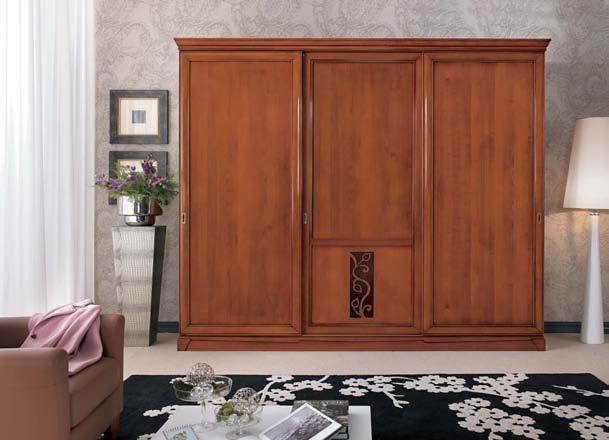 114 115 articolo 3118 armadio 3 ante scorrevoli con zoccolo chiuso finitura noce biondo particolari moka. wardrobe 3 sliding doors with closed plinth blond walnut polishing moka details. cm. l.