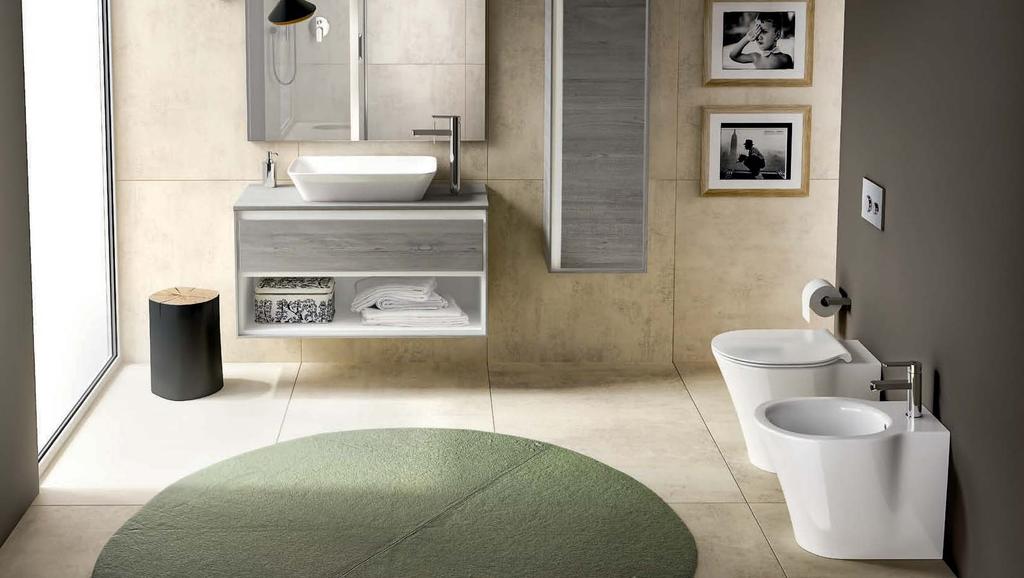 14 15 Lavabo da appoggio Connect AIR 60 cm abbinato a mobile sottolavabo 100 cm e colonna 120 cm legno grigio. Sanitari filo parete Connect AIR. Miscelatori Giò.